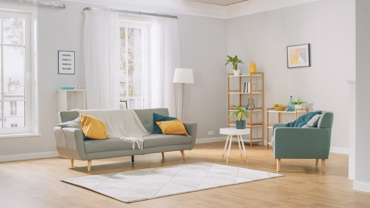 Shot of a Bright Cozy Modern Apartment with Big Windows, Decorations and Stylish Furniture. living room with painted walls